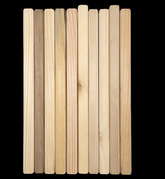 Sauna timber samples showing different natural grain patterns and tones